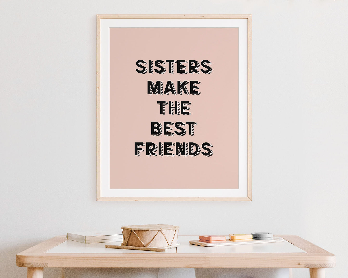 Sisters Make The Best Friends Instant Download Digital File featuring retro block shadowed lettering in black on a blush pink background.
