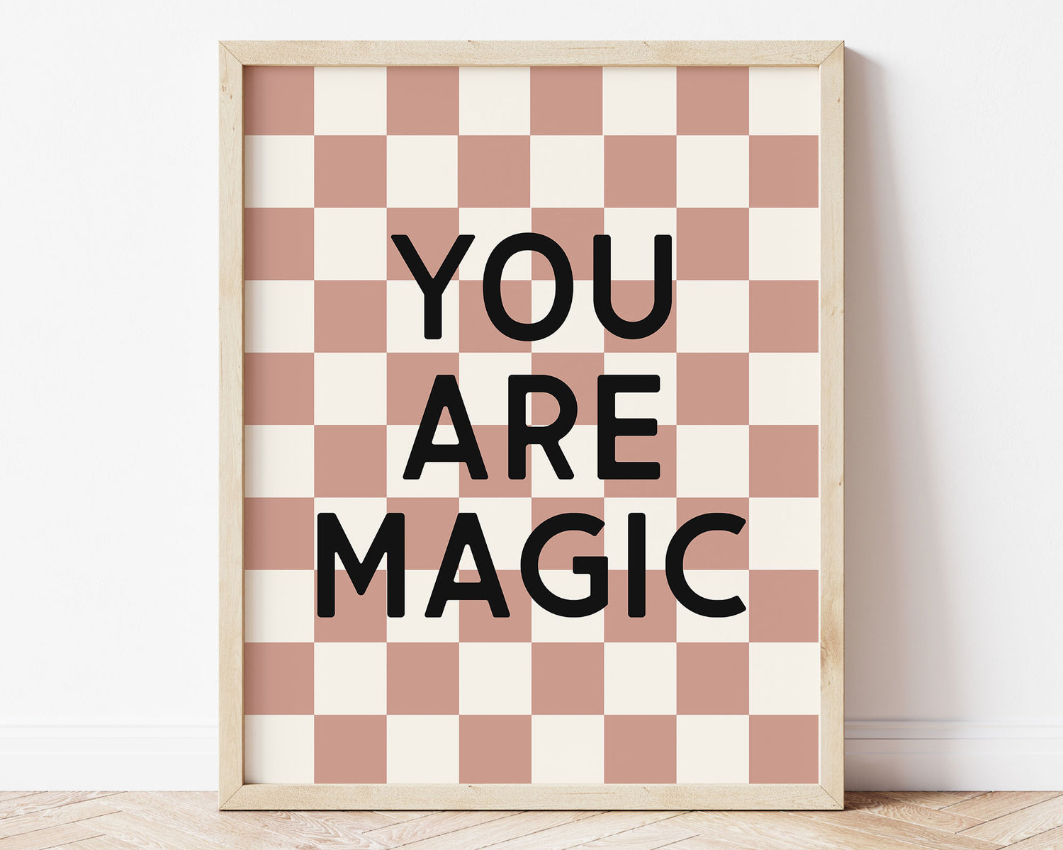 You Are Magic Instant Download Digital File featuring block lettering in black on an dusky rose and off white checkered background. Perfect for Baby Girls Nursery Decor, Toddler Girly Bedroom Decor or Little Girl Playroom Wall Art.