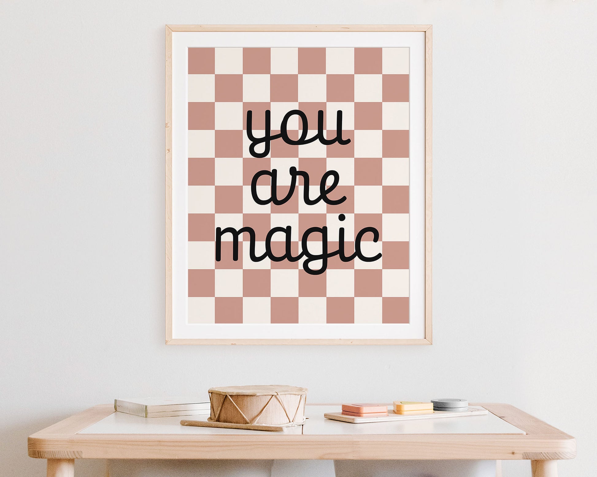 You Are Magic Instant Download Digital File featuring cursive script lettering in black on an dusky rose and off white checkered background. Perfect for Baby Girls Nursery Decor, Toddler Girly Bedroom Decor or Little Girl Playroom Wall Art.