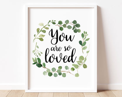 "You are so Loved" inspirational quote in cursive lettering inside a Watercolor Botanical Greenery Wreath Printable Wall Art. Great for Baby Boy or Baby Girl Nursery Decor or Kids Room Wall Hangings.