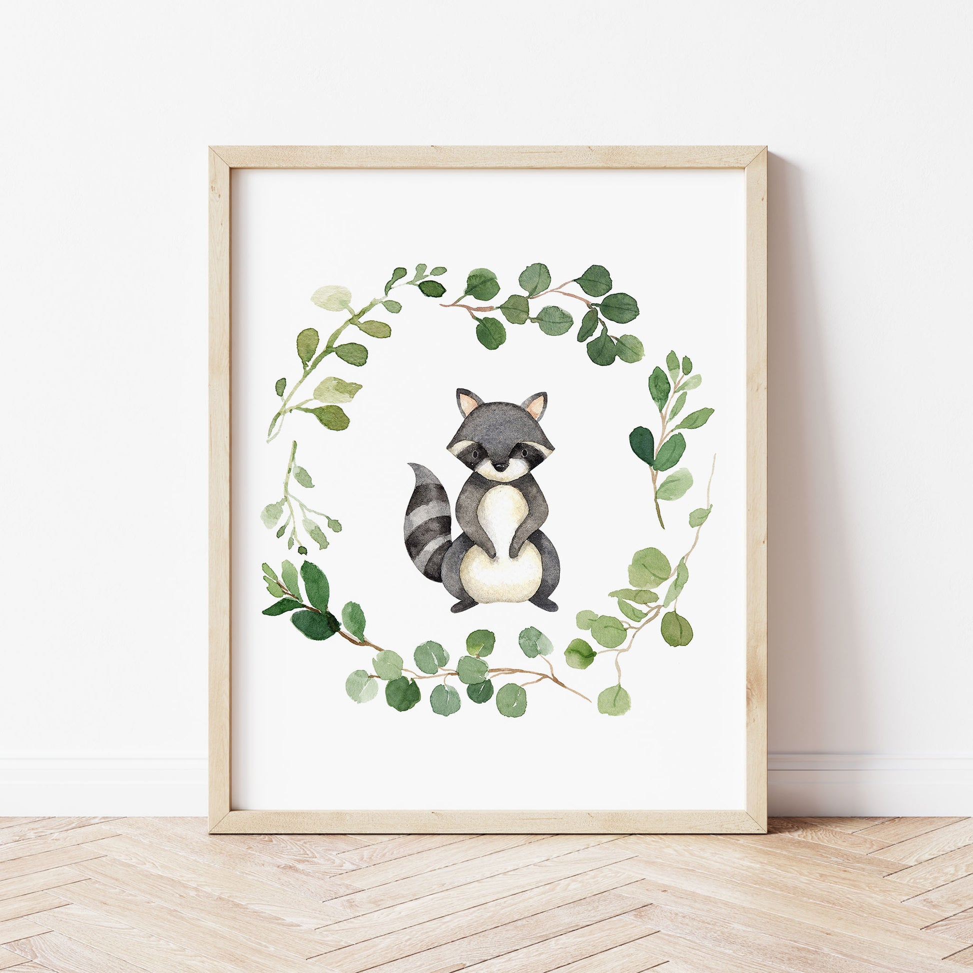 Watercolor Raccoon in a Greenery Eucalyptus Wreath Printable Wall Art perfect for Gender Neutral Woodland Nursery Decor or Kids Room Decor for boys or girls.