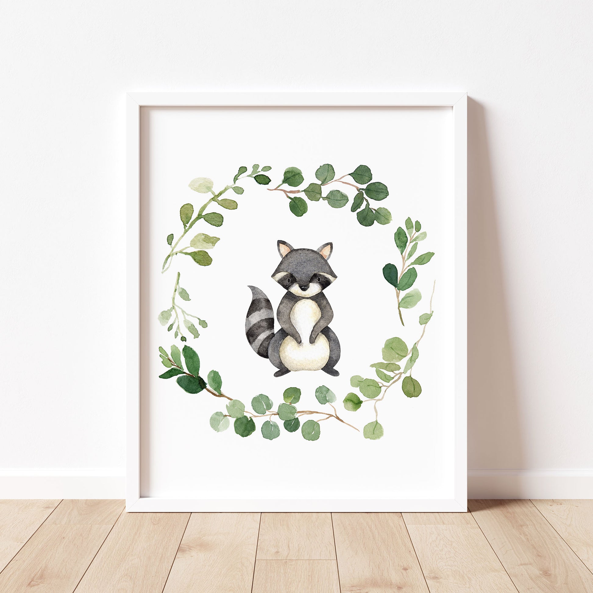 Watercolor Raccoon in a Greenery Eucalyptus Wreath Printable Wall Art perfect for Gender Neutral Woodland Nursery Decor or Kids Room Decor for boys or girls.