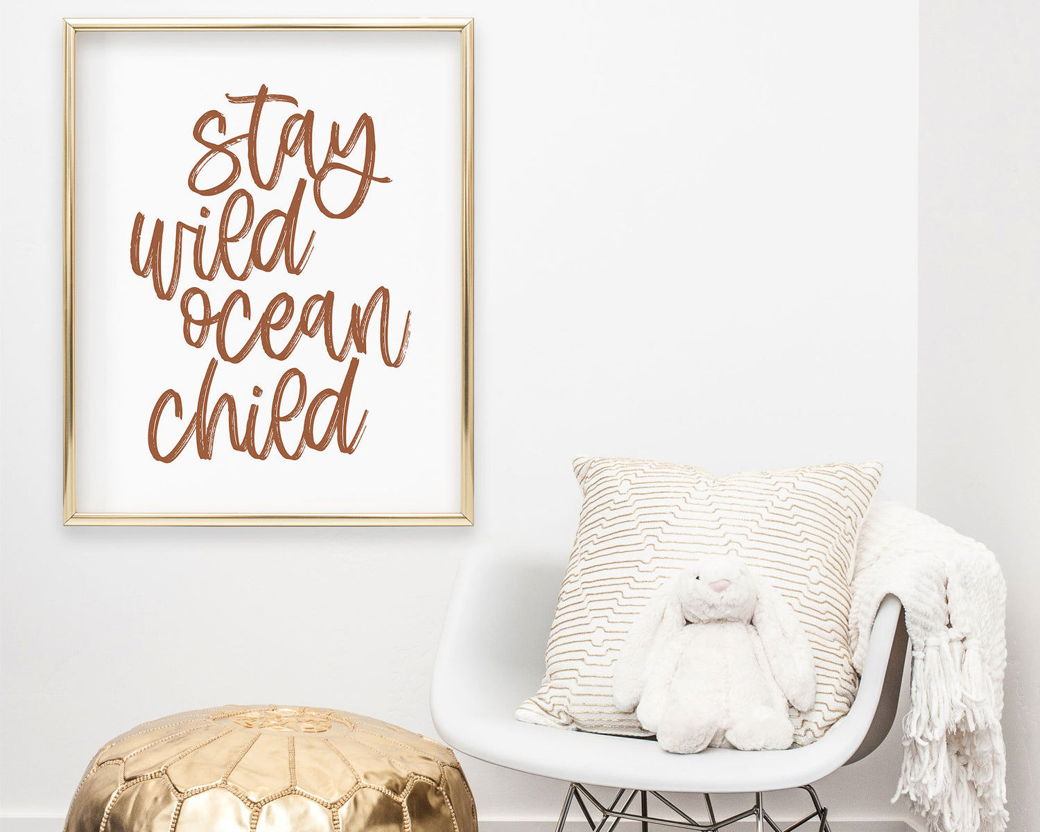Earth Tone Stay Wild Ocean Child Printable Wall Art featuring a textured brush style cursive lettered quote in a rust / clay / terracotta color. Perfect for Baby Girl Nautical Nursery Decor, Baby Boy Surf Nursery Wall Art, Gender Neutral Beach Nursery Art, Nautical Kids Bedroom Decor or Children's Coastal Bathroom Wall Art.