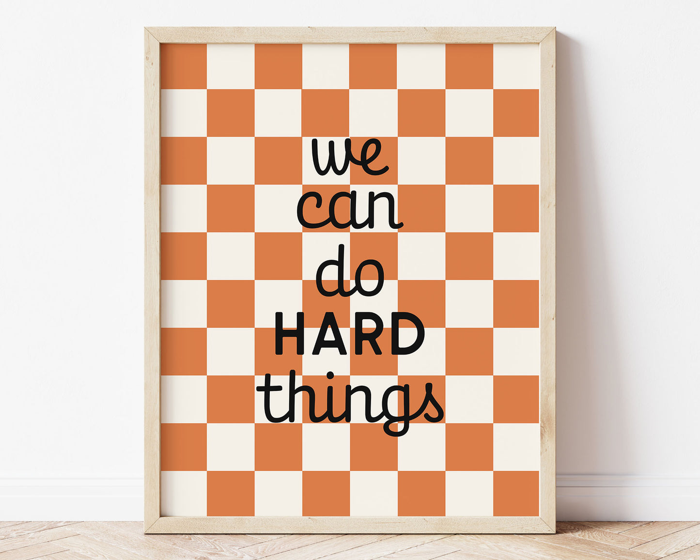 We Can Do Hard Things Instant Download Digital File featuring cursive script and block lettering in black on an orange and off white checkered background. Perfect for Baby Girls Nursery Decor, Toddler Boys Bedroom Decor or Little Kids Playroom Wall Art.
