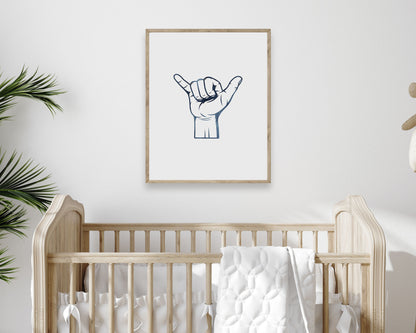 Watercolor Shaka Printable Wall Art featuring navy blue watercolor illustration of shaka hang loose hand sign. Perfect for Baby Boy Surf Nursery Decor, Baby Girl Surf Nursery Wall Art, Kids Coastal Bedroom Decor, Children's Beach Bathroom Wall Art or Hawaii Wall Art Playroom Decor.