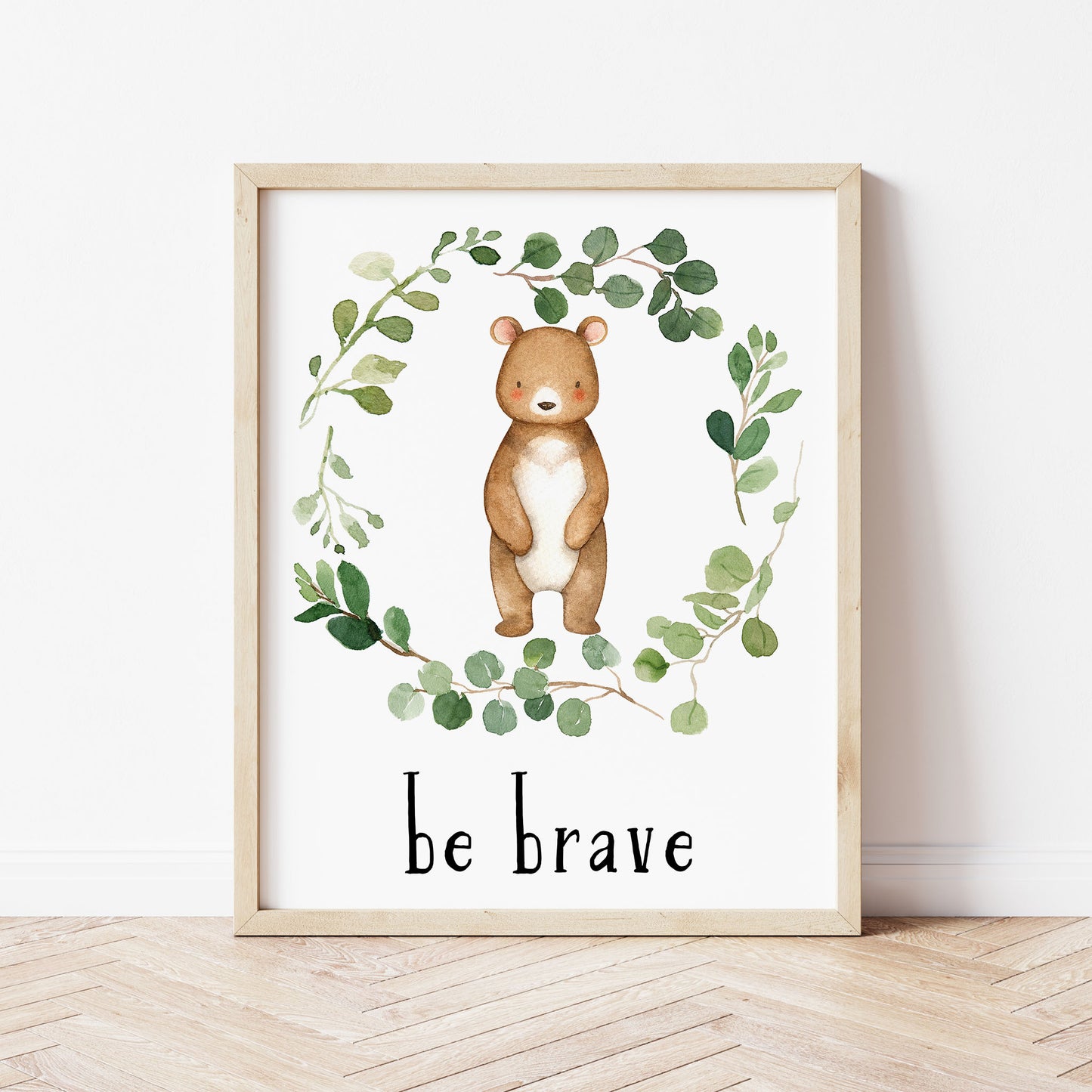 Watercolor Bear in a Eucalyptus Greenery Wreath with inspirational quote 'Be Brave ' in black lowercase lettering. Gender neutral instant download digital wall art print.