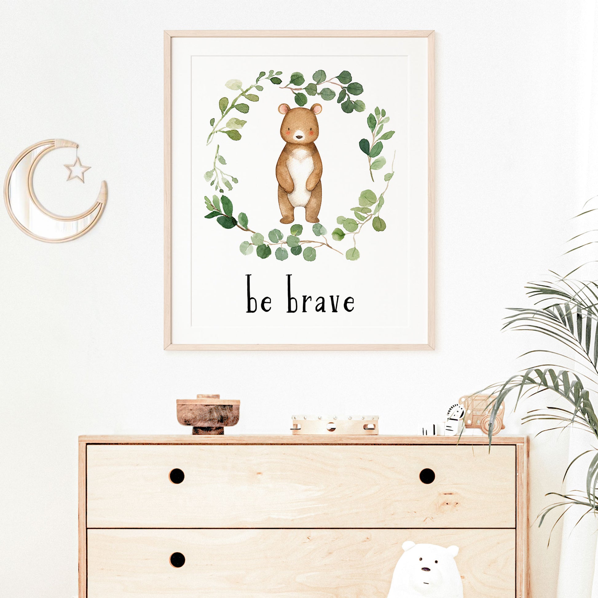 Watercolor Bear in a Eucalyptus Greenery Wreath with inspirational quote 'Be Brave ' in black lowercase lettering. Gender neutral instant download digital wall art print.