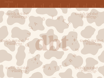 Neutral tan and off white cow print seamless pattern scale digital file for small shops that make handmade products in small batches.