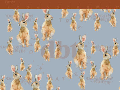 Watercolor bunnies on a cadet blue background seamless pattern scale digital file for small shops that make handmade products in small batches.